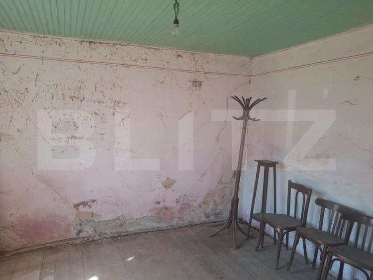 Casă individuală cu 2 camere cu Teren 5000 Mp în Mogoșani