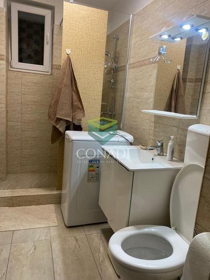 Apartament cu 3 camere semidecomandat, mobilat în Calea București