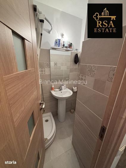 Garsoniera de vanzare etaj 1 zona Dovali Rm Valcea