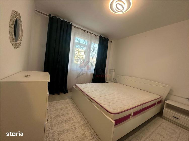 Apartament cu 2 camere semidecomandat, mobilat în Podu Roș