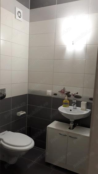 Apartament cu 3 camere decomandat în Tractorul