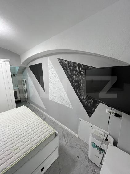 Apartament cu 2 camere semidecomandat, mobilat în Central