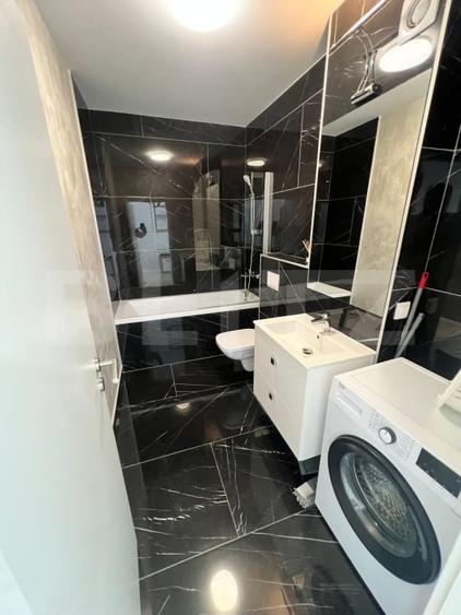 Apartament cu 3 camere semidecomandat, mobilat în Chinteni