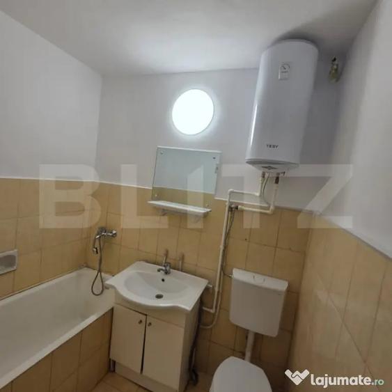 Apartament cu 3 camere semidecomandat în Central