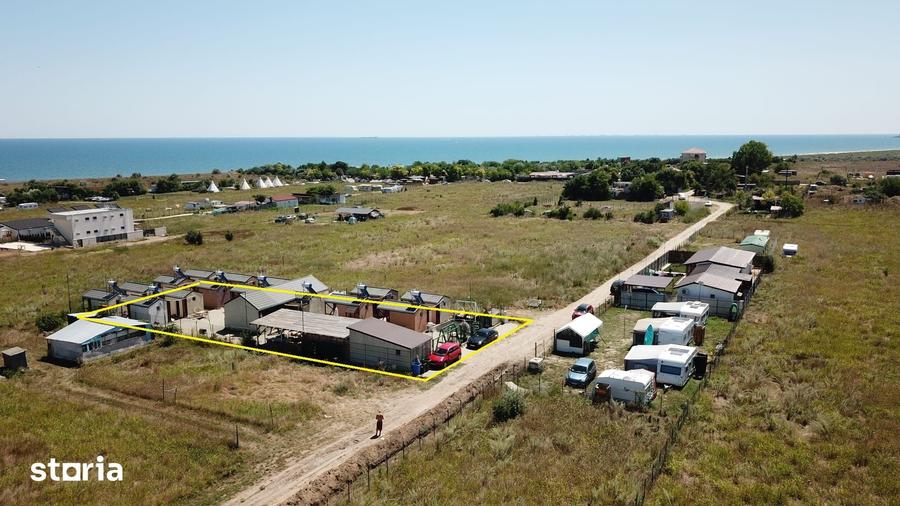 Casă cu Teren 940 Mp în Corbu