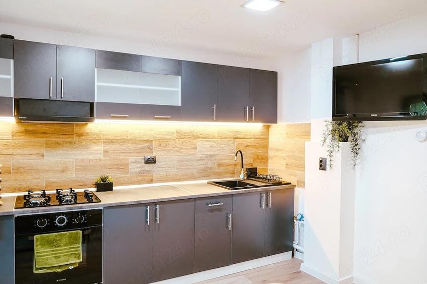 Apartament cu 4 camere decomandat în Central