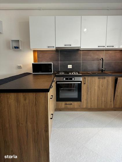 Apartament cu 2 camere semidecomandat în Botizului