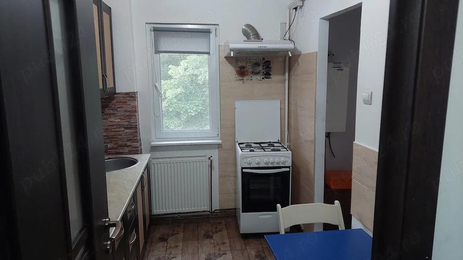 Apartament cu 2 camere semidecomandat în Podu Roș