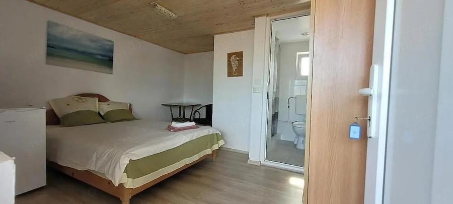 Casă cu 9 camere cu Teren 300 Mp în Central