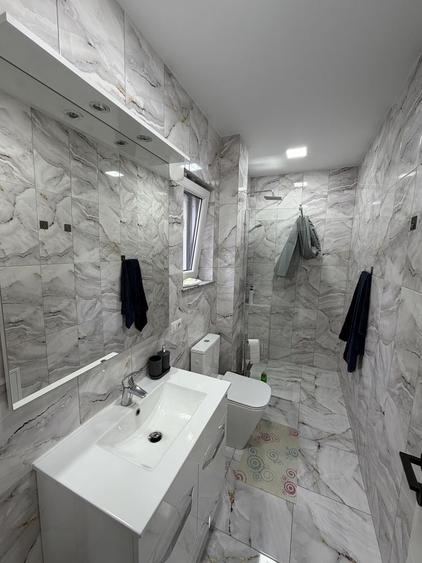 Casă cu 4 camere cu Teren 100 Mp în Central