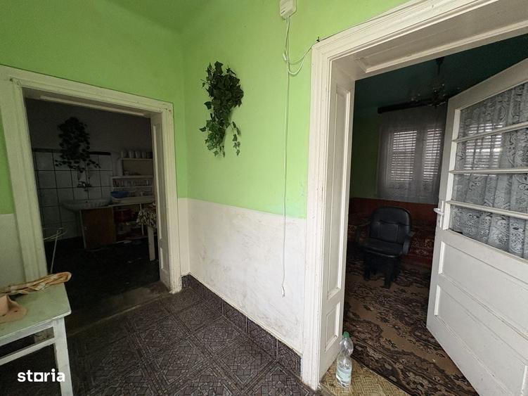 Casă cu 4 camere în Sântion