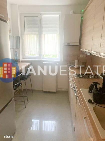 Apartament cu 3 camere decomandat în Titan
