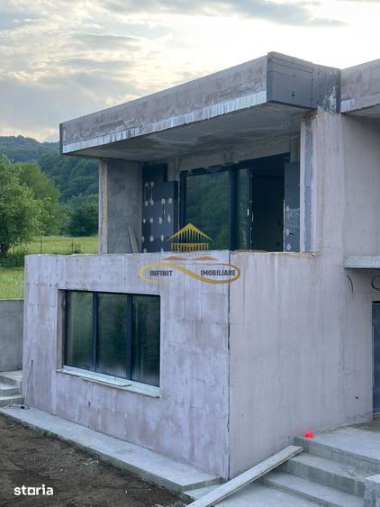 Casă cu 2 camere cu Teren 2500 Mp în Dofteana