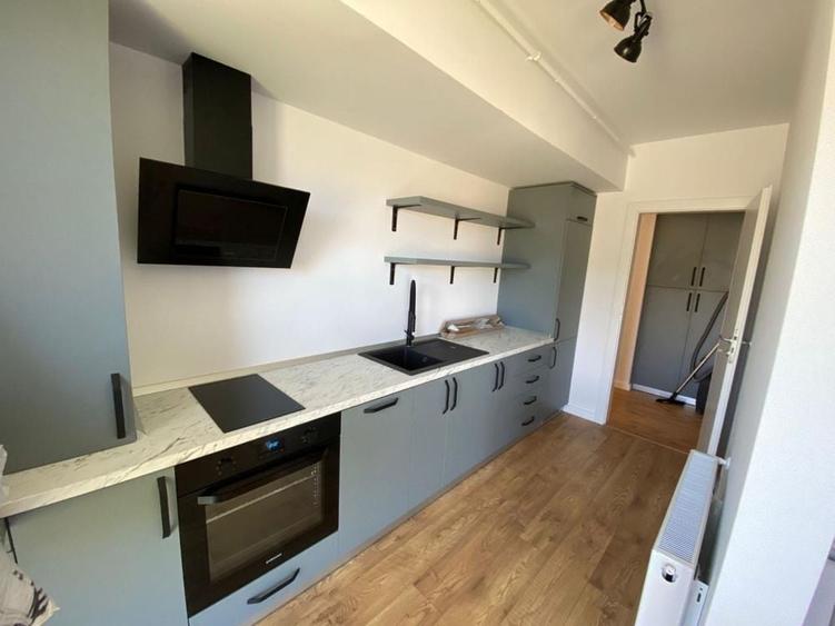 Apartament cu 2 camere decomandat în Tractorul
