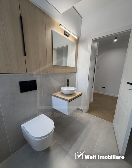 Apartament cu 3 camere semidecomandat, mobilat în Borhanci