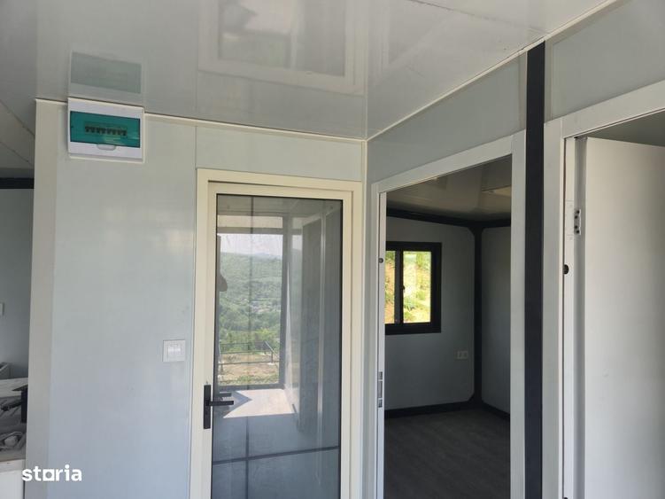 Casă cu 2 camere cu Teren 450 Mp în Tomești