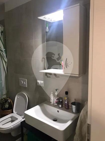 Apartament cu 2 camere decomandat în Tractorul