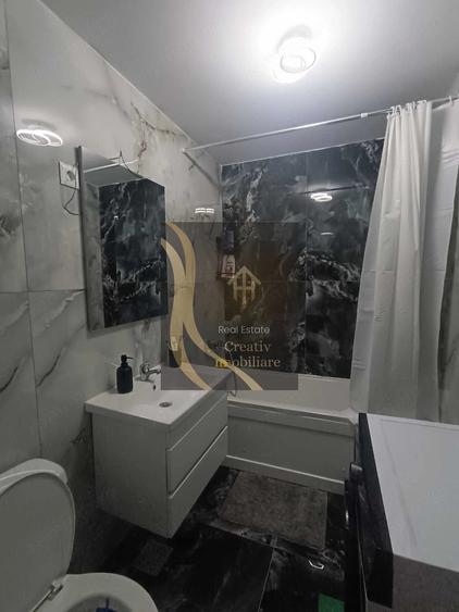 Garsonieră decomandată în Central