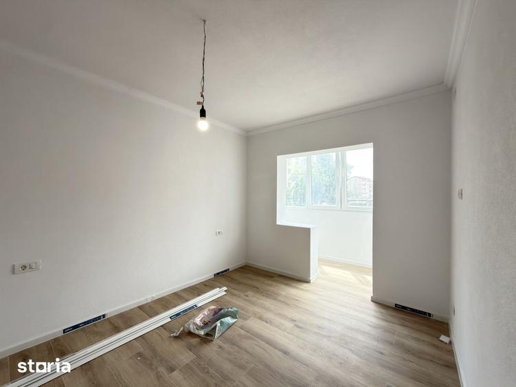 Apartament cu 3 camere, decomandat, 71mp, etaj 1 - zona Dambovita - 8