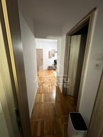 Apartament cu 2 camere semidecomandat, mobilat în Dacia