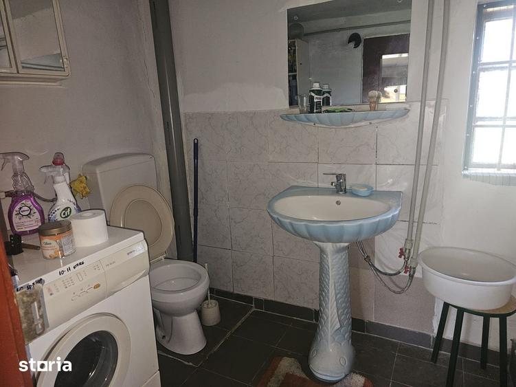 Casă cu Teren 1000 Mp în Stâlpeni