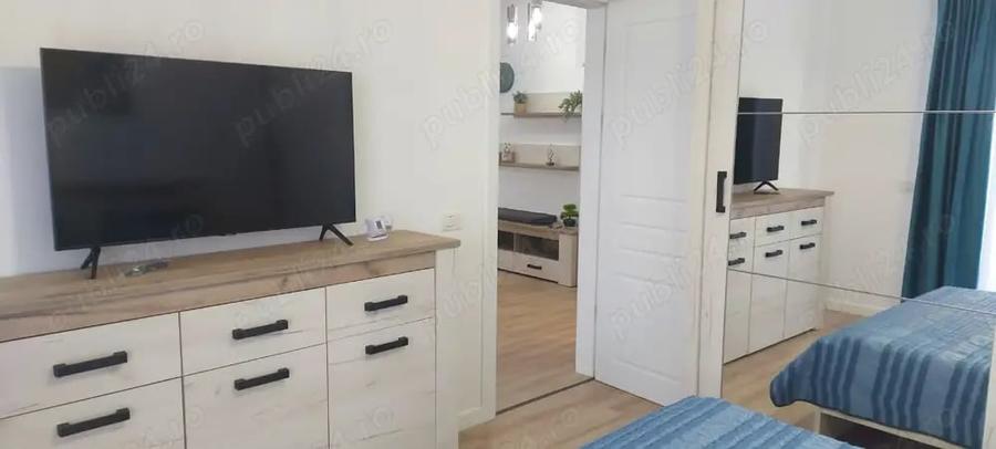 Apartament cu 2 camere semidecomandat, mobilat în Central