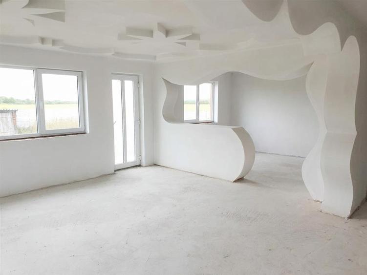 Casă cu 5 camere cu Teren 900 Mp în Tileagd