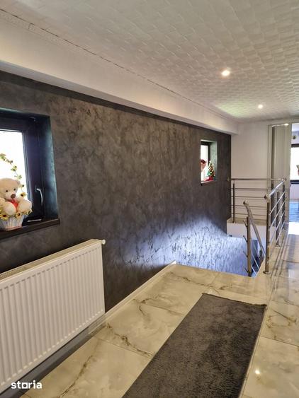 Casă cu 4 camere cu Teren 259 Mp în Comana