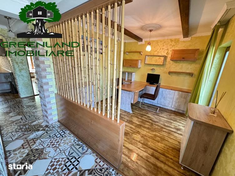Apartament cu 7 camere decomandat în Bucium