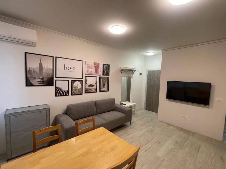 Apartament cu 3 camere semidecomandat, mobilat în Giroc