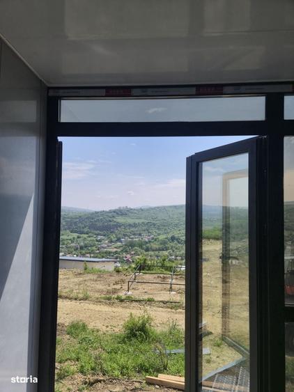 Casă cu 2 camere cu Teren 450 Mp în Tomești