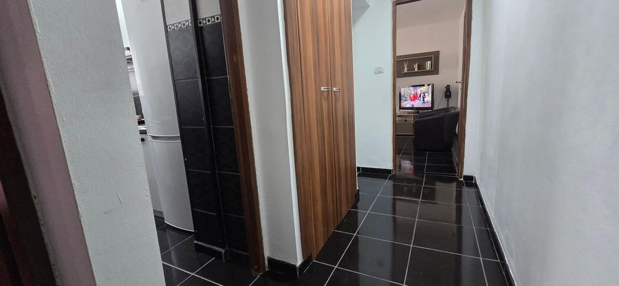 Apartament cu 3 camere semidecomandat, mobilat în Micro 5