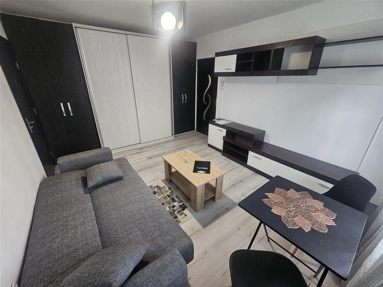 Apartament cu 2 camere semidecomandat, mobilat în Florilor