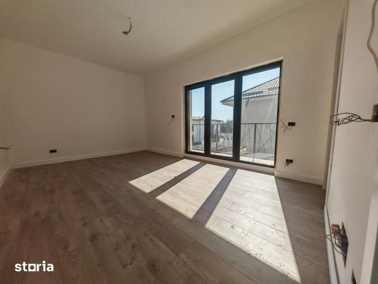 Casă cu 4 camere cu Teren 350 Mp în Tunari