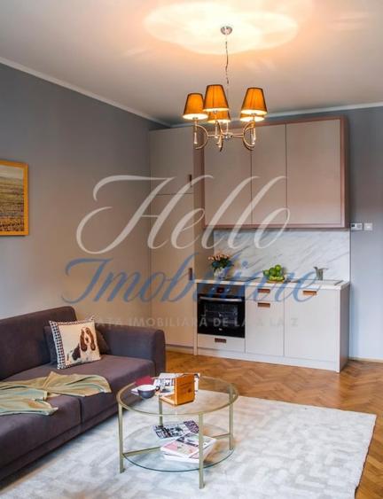 Apartament cu 3 camere semidecomandat, mobilat în Central