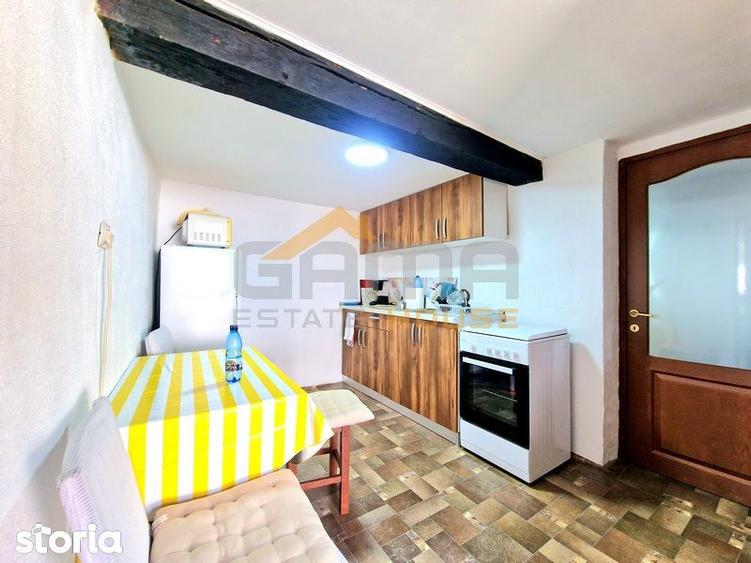 Casă cu 2 camere cu Teren 1464 Mp în Tauț
