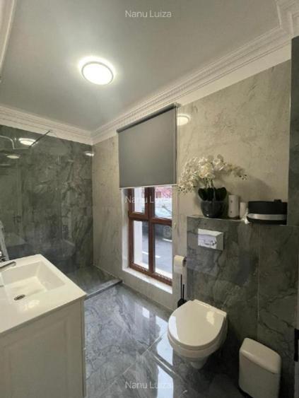 Casă cu 5 camere cu Teren 200 Mp în Titan