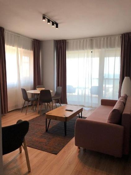 Apartament cu 2 camere semidecomandat, mobilat în Central