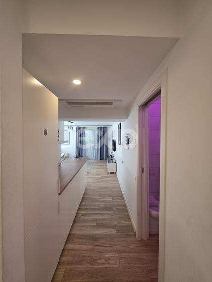 Apartament cu 3 camere semidecomandat, mobilat în Banu Manta