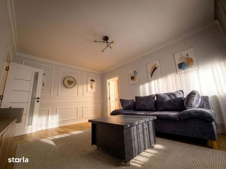 Apartament cu 3 camere semidecomandat, mobilat în Central