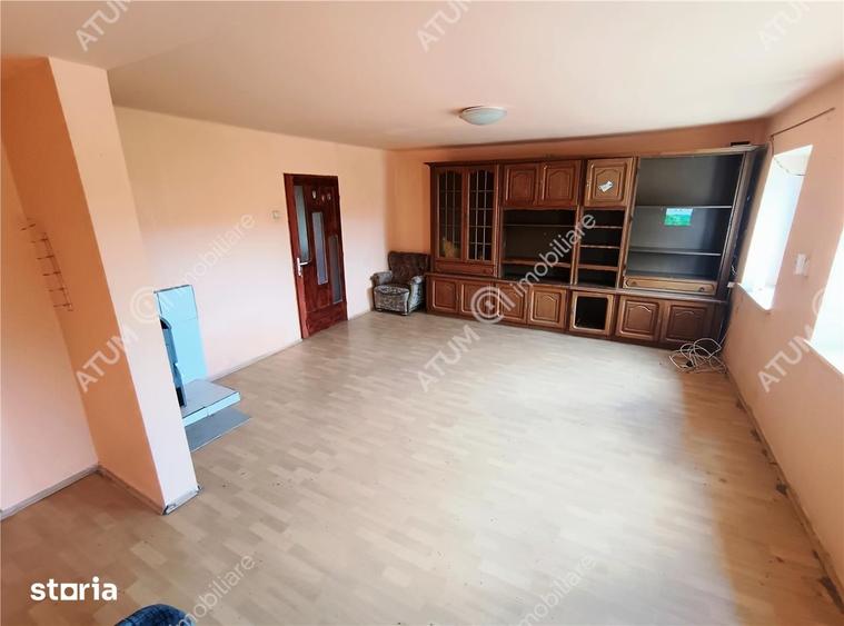 Casă cu 4 camere decomandat cu Teren 1650 Mp în Porumbacu de Jos