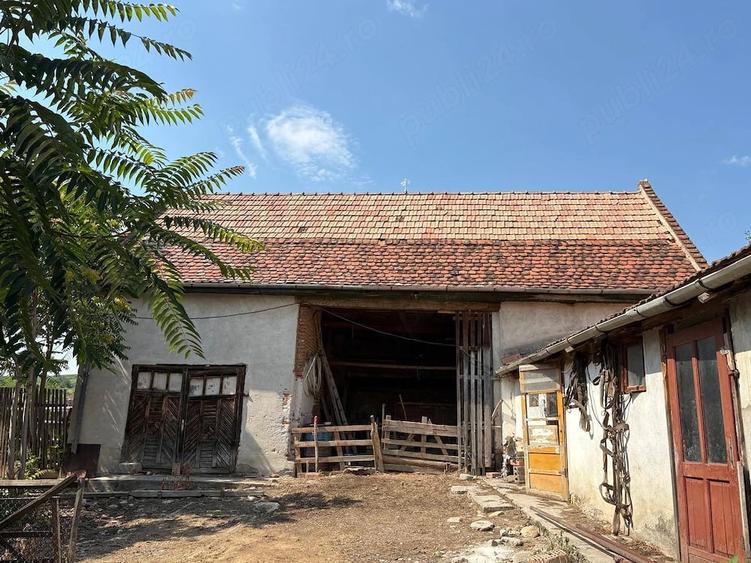 Casă cu Teren 700 Mp în Cut