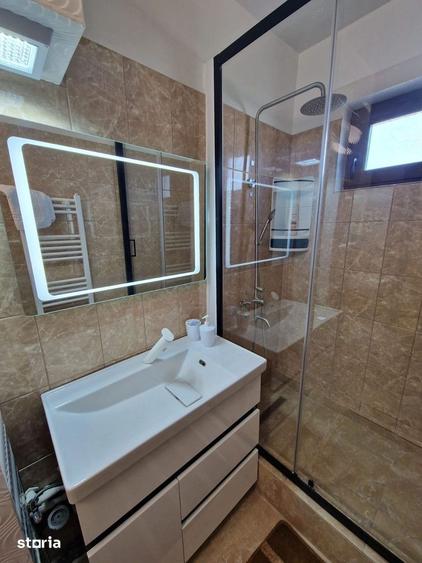 Apartament cu 2 camere semidecomandat, mobilat în Central