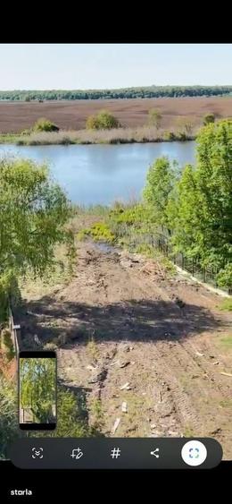 Teren intravilan 2.300 mp cu deschidere la lac, Ciofliceni - 2