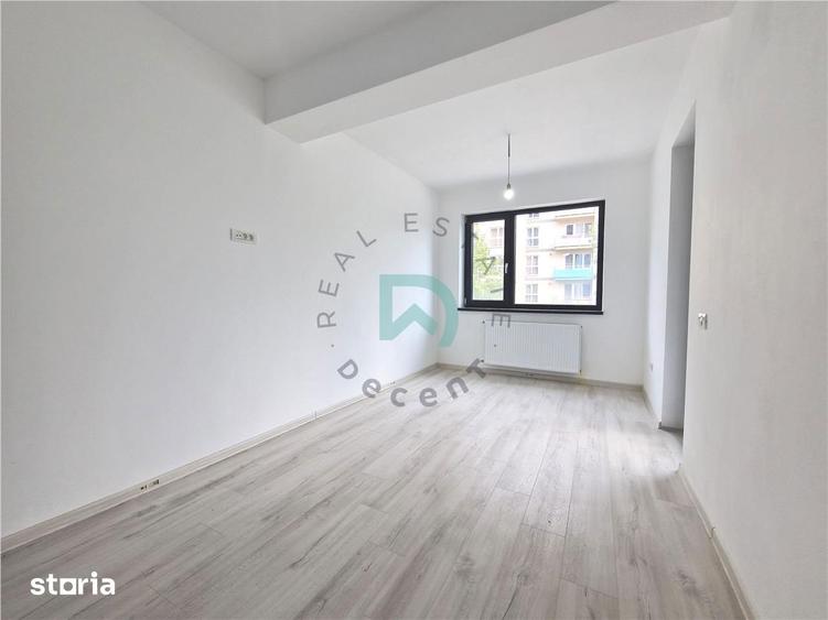 Apartament cu 3 camere decomandat în Tractorul
