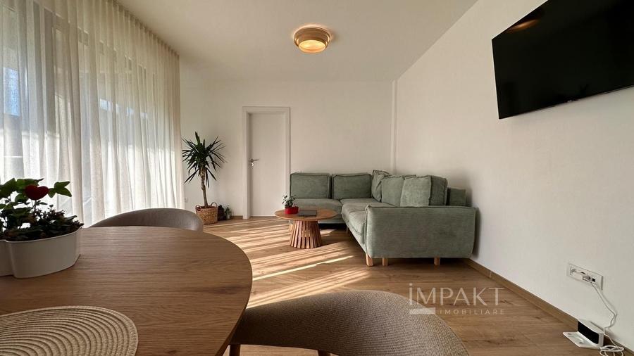 Apartament cu 3 camere semidecomandat, mobilat în Borhanci