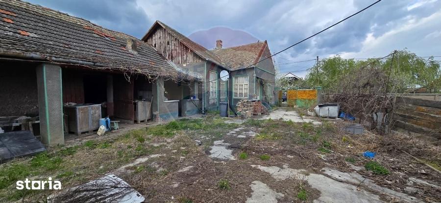 Casă cu 3 camere cu Teren 936 Mp în Socodor
