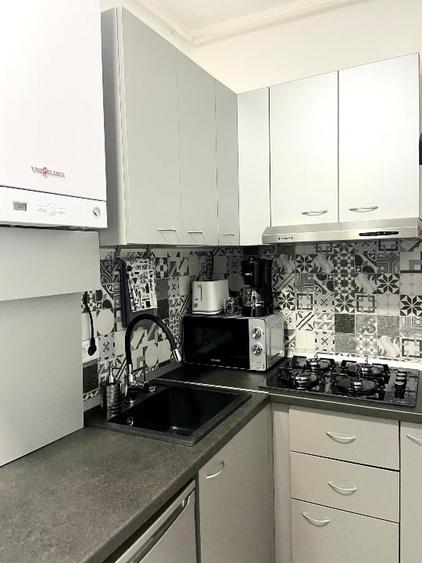 Apartament cu 2 camere semidecomandat, mobilat în Centrul Istoric