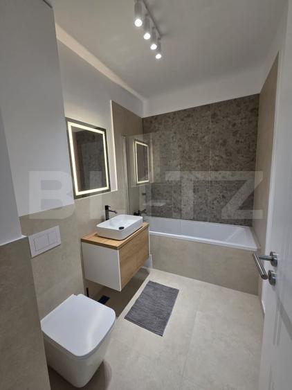 Apartament cu 2 camere semidecomandat, mobilat în Florești