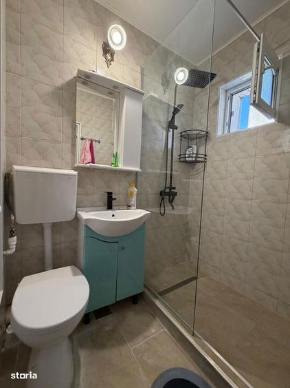 Apartament cu 2 camere semidecomandat, mobilat în Central